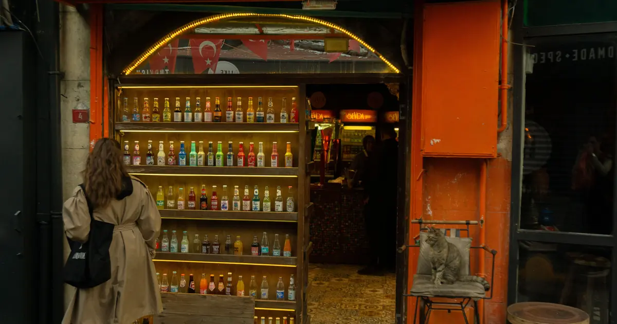 cat beside a soda can