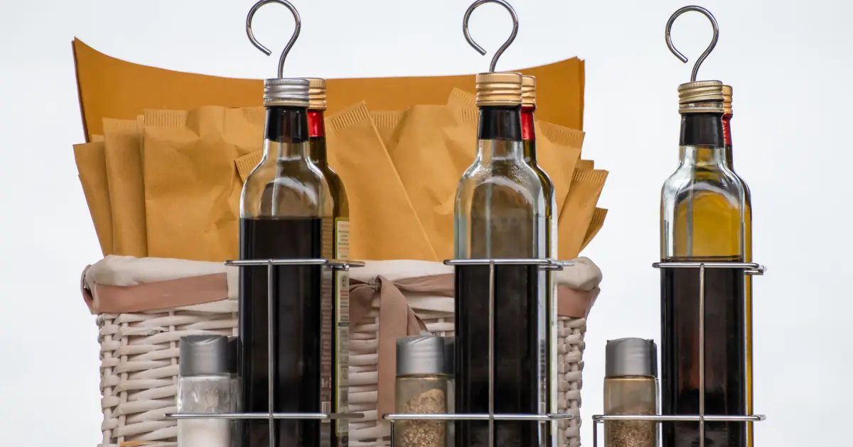 undiluted vinegar is too acidic and harsh for cats